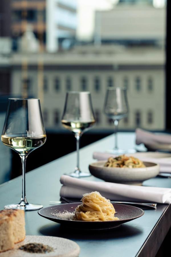 Next Hotel Melbourne, Curio Collection By Hilton Exteriör bild Wine glasses